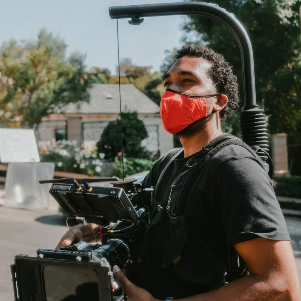 Educational Video Companies Employee Holding a Camera